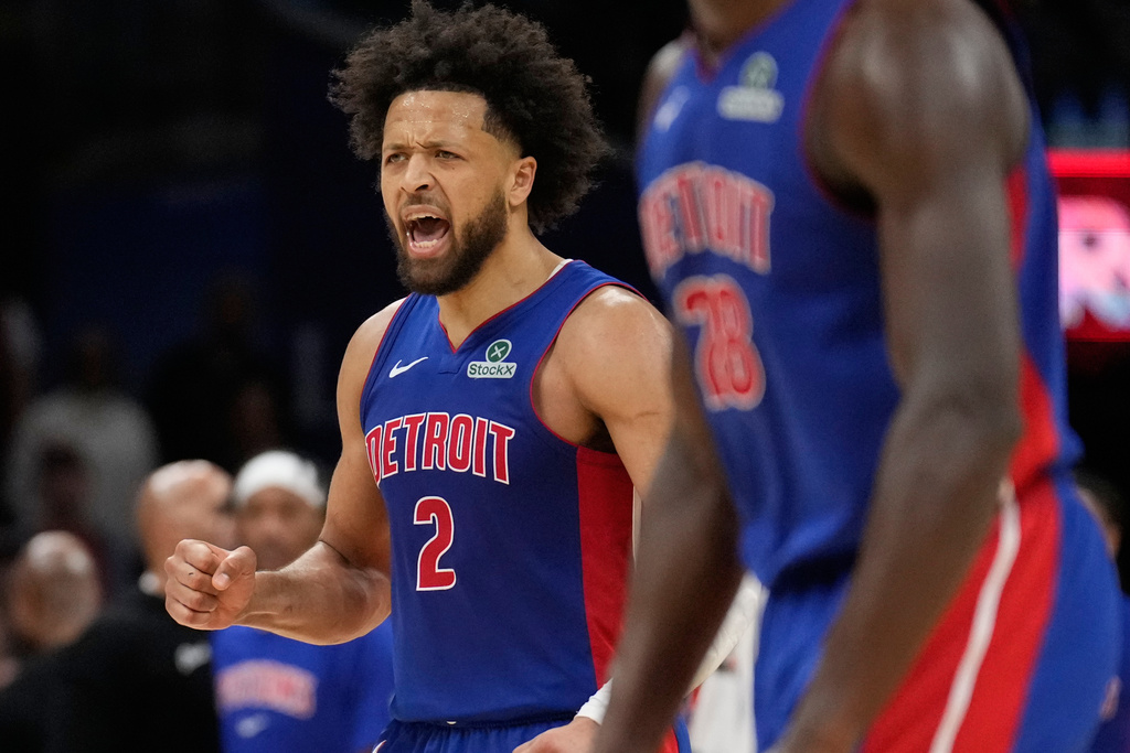 Detroit Pistons guard Cade Cunningham (2) reacts in the second half of an NBA basketball game against the Cleveland Cavaliers Sunday, Jan. 4, 2026, in Cleveland. (AP Photo/Sue Ogrocki)