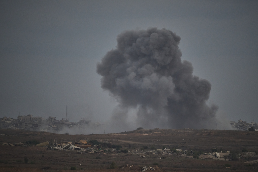 Smoke rises to the sky following an Israeli military strike in the northern Gaza Strip, as seen from southern Israel, Monday, Oct. 6, 2025. (AP Photo/Leo Correa)