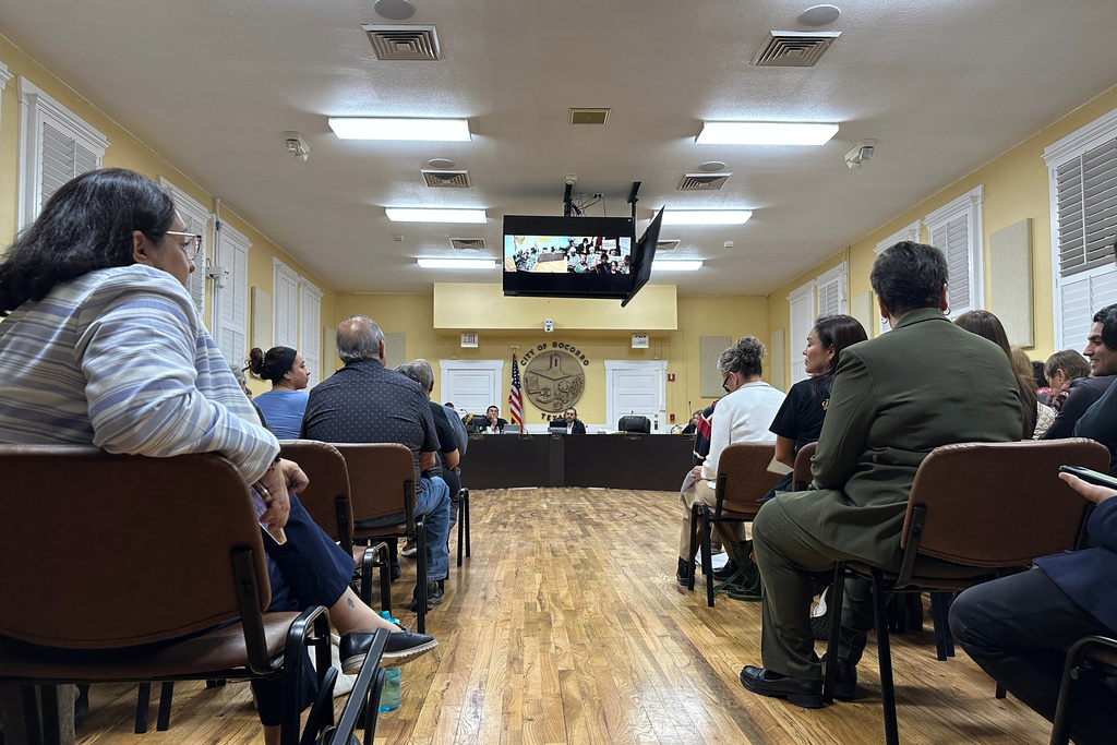 A public comment session takes place at a City Council meeting on Wednesday, Feb. 11, 2026, in Socorro, Texas, regarding the purchase of three hulking warehouses in connection with U.S. Immigration and Customs Enforcement's expansion of immigrant detention centers. (AP Photo/Morgan Lee)