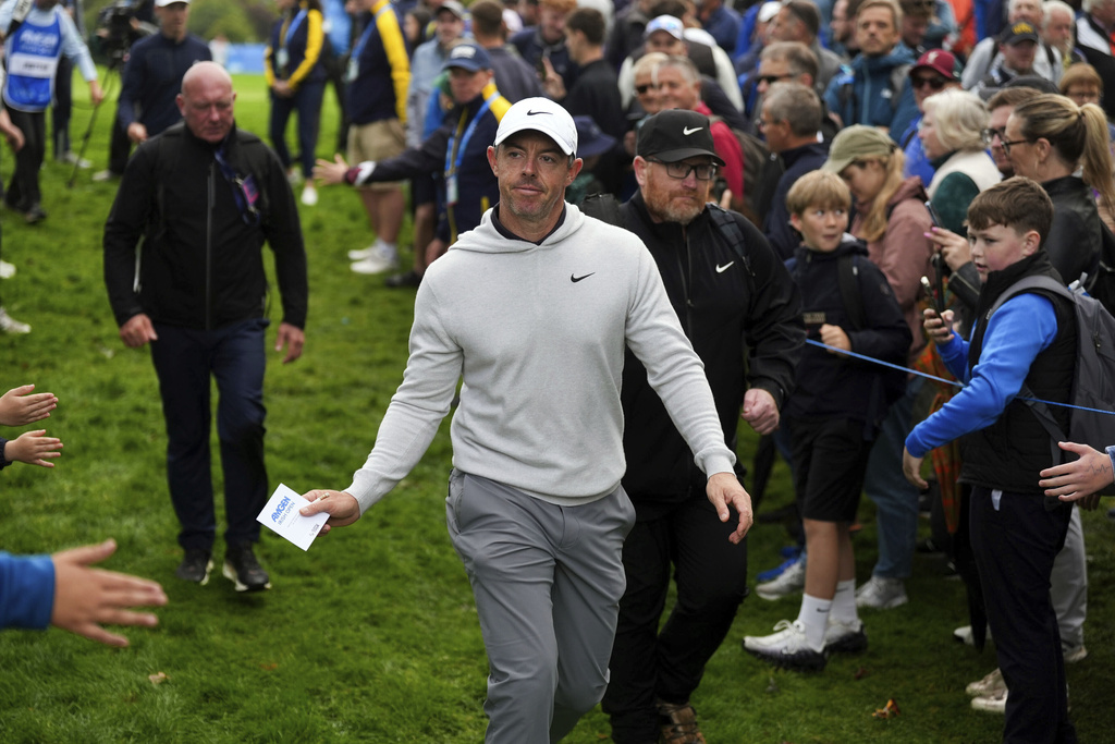 Rory McIlroy walks the course between fans during the Irish Open golf tournament, Thursday, Sept. 4, 2025, at The K Club in Straffan, Ireland. (Brian Lawless/PA via AP)