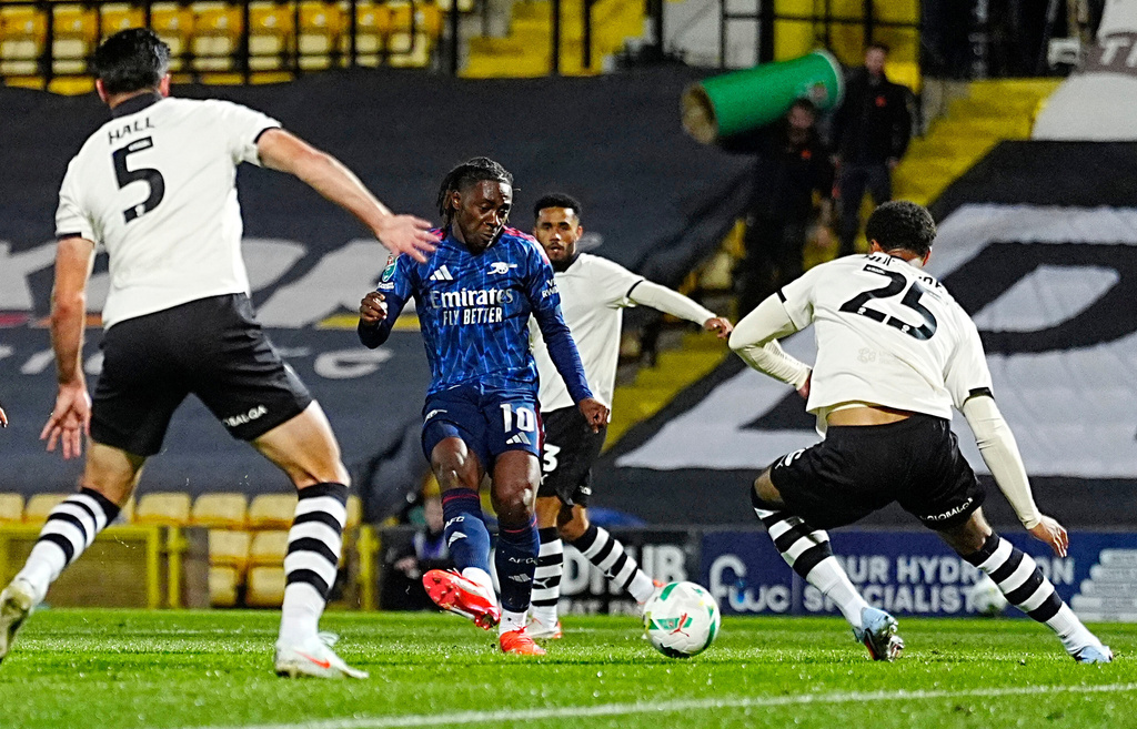 Arsenal's Eberechi Eze scores their side's first goal of the game during the English League cup third round soccer match between Port Vale and Arsenal at Vale Park, Stoke-on-Trent, England, Wednesday, Sept. 24, 2025. (Peter Byrne/PA via AP)