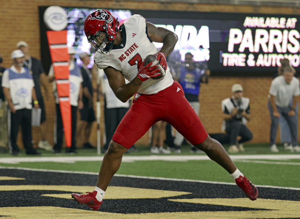 North Carolina State tight end Just Joly catches a five-yard touchdown reception against Wake Forest during an NCAA college football game Thursday, Sept. 11, 2025, in Winston-Salem, N.C. (Walt Unks/The Winston-Salem Journal via AP)