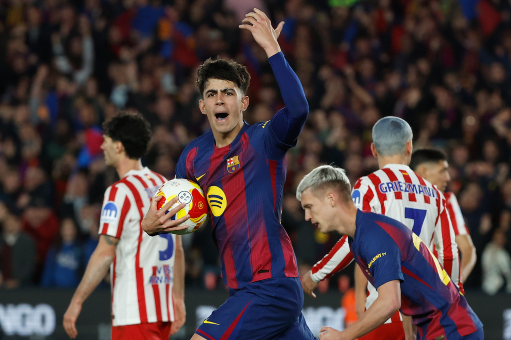 Barcelona's Marc Bernal celebrates after scoring his side's third goal during the Copa del Rey semifinal second leg soccer match between Barcelona and Atletico Madrid in Barcelona, Spain, Tuesday, March 3, 2026. (AP Photo/Joan Monfort)