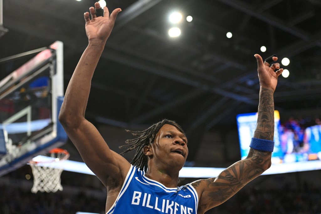 Saint Louis' Quentin Jones (1) reacts after scoring against Virginia Commonwealth during the second half of an NCAA college basketball game, Friday, Feb. 20, 2026, in St. Louis. (AP Photo/Lexie Knight)