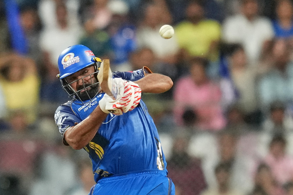 Mumbai Indians' Rohit Sharma plays a shot during the Indian Premier League cricket match between Mumbai Indians and Lucknow Super Giants in Mumbai, India, Monday, May 4, 2026.(AP Photo/Rafiq Maqbool)