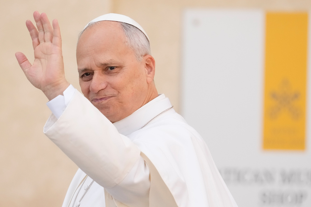 Pope Leo XIV waves to faithful as he arrives in St. Peter's Square on the occasion of the last Jubilee audience, at the Vatican, Saturday, Dec. 20, 2025. (AP Photo/Gregorio Borgia)