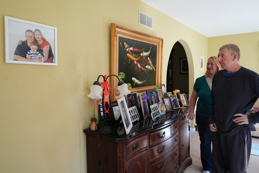 Martha Swick, left, and her husband Bill Swick look at a photo at their home in Minooka, Ill., Friday, Oct. 24, 2025. (AP Photo/Nam Y. Huh) Martha Swick, left, and her husband Bill Swick look at a photo at their home in Minooka, Ill., Friday, Oct. 24, 2025. (AP Photo/Nam Y. Huh)