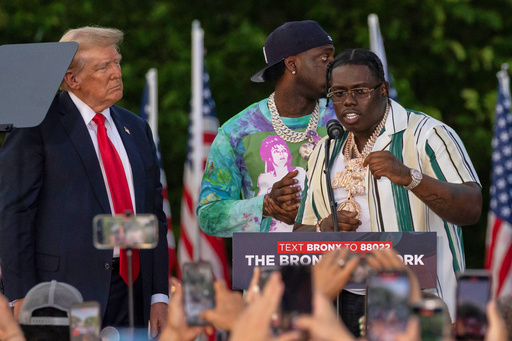 FILE - Rapper Sheff G, also known as Michael Williams, right, joins then Republican presidential candidate Donald Trump during a campaign rally in the Bronx borough of New York on May. 23, 2024. (AP Photo/Yuki Iwamura, File) FILE - Rapper Sheff G, also known as Michael Williams, right, joins then Republican presidential candidate Donald Trump during a campaign rally in the Bronx borough of New York on May. 23, 2024. (AP Photo/Yuki Iwamura, File)