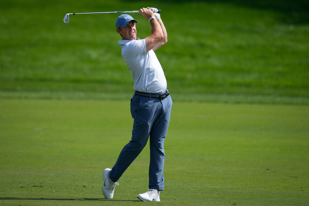 Rory McIlroy of Northern Ireland plays his second shot on the 9th hole during third round of the Dubai Desert Classic in United Arab Emirates, Saturday, Jan. 24, 2026. (AP Photo/Altaf Qadri)
