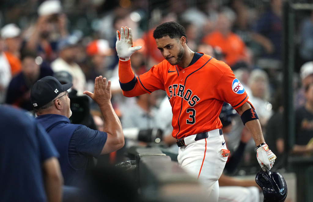 Houston Astros' Jeremy Pena (3) celebrates after his home run off Seattle Mariners starting pitcher Bryan Woo during the fourth inning of a baseball game, Sunday, Aug. 16, 2026, in Houston. (AP Photo/Karen Warren)
