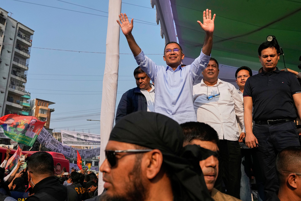 Tarique Rahman, the son of former Prime Minister Khaleda Zia and chairman of the Bangladesh Nationalist Party (BNP), waves to the crowd during an election rally in Dhaka, Bangladesh, Sunday, Feb. 8, 2026. (AP Photo/Anupam Nath)