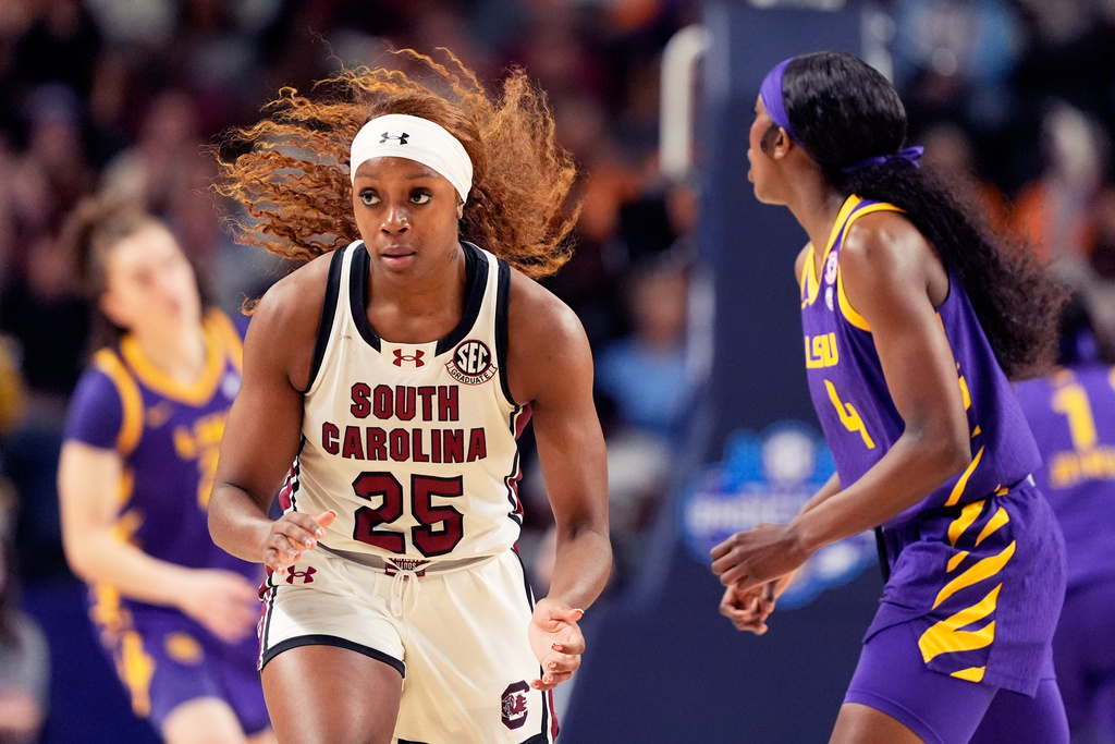 South Carolina guard Raven Johnson celebrates after scoring against LSU during the first half of an NCAA college basketball game in the semifinals of the Southeastern Conference tournament, Saturday, March 7, 2026, in Greenville, S.C. (AP Photo/Chris Carlson)