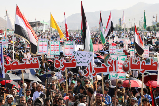 Houthi supporters celebrate following the announcement that Israel and Hamas have agreed to the first phase of a peace plan to pause the fighting, in Sanaa, Yemen, Friday, Oct. 10, 2025. Arabic reads, "Gaza victory". (AP Photo/Osamah Abdulrahman) Houthi supporters celebrate following the announcement that Israel and Hamas have agreed to the first phase of a peace plan to pause the fighting, in Sanaa, Yemen, Friday, Oct. 10, 2025. Arabic reads, "Gaza victory". (AP Photo/Osamah Abdulrahman)