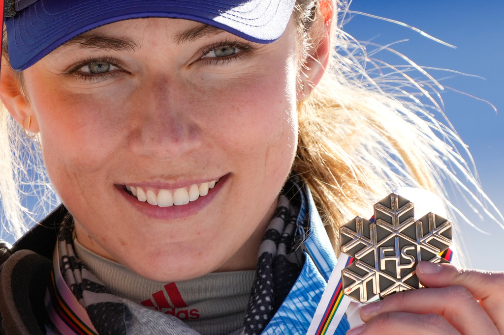 FILE - United States' Mikaela Shiffrin shows her bronze medal at the alpine ski World Championships in Cortina d'Ampezzo, Italy, Feb. 20, 2021. (AP Photo/Giovanni Auletta, File)