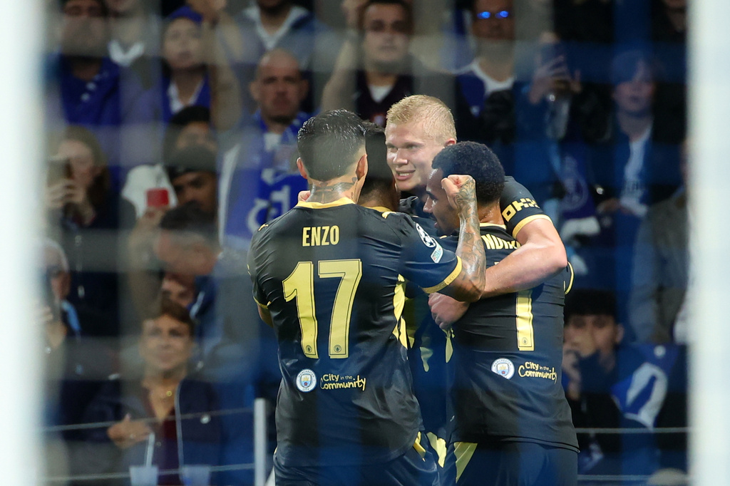 Manchester City's Erling Haaland, center, celebrates after scoring his side's second goal during a Champions League opening phase soccer match between FC Porto and Manchester City in Porto, Portugal, Tuesday, Sept. 8, 2026. (AP Photo/Luis Vieira)