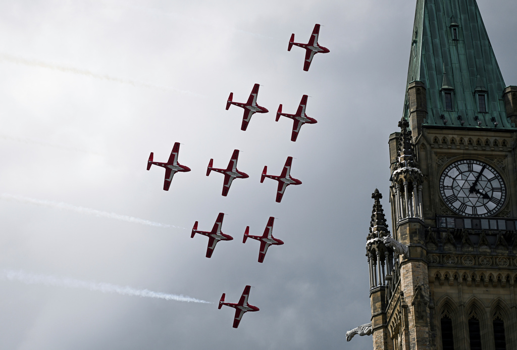 FILE - Royal Canadian Air Force (RCAF) Snowbirds conduct a fly-past over Parliament Hill during Canada Day celebrations at LeBreton Flats in Ottawa, Ontario, July 1, 2025. (Spencer Colby/The Canadian Press via AP)
