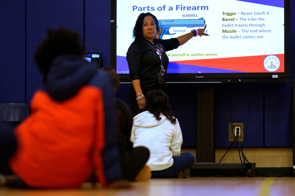 Health and physical education teacher Tammie Chapman leads a gun safety lesson for elementary students at Berclair Elementary School, Monday, Oct. 27, 2025, in Memphis, Tenn. (AP Photo/George Walker IV)