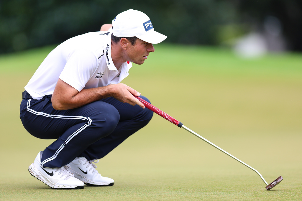 Viktor Hovland reads his putt on the second hole during the first round of the Tour Championship golf tournament, Thursday, Aug. 27, 2026, in Atlanta. (AP Photo/Colin Hubbard)