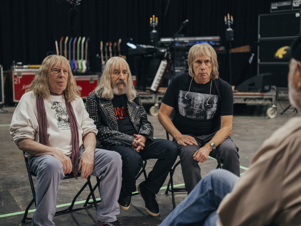 This image released by Bleecker Street shows, from left, Christopher Guest, Harry Shearer, and Michael McKean, in a scene from "Spinal Tap II: The End Continues." (Kyle Kaplan/Bleecker Street via AP)