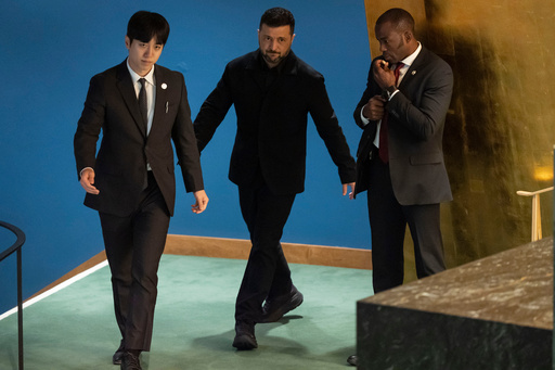 Ukraine President Volodymyr Zelenskyy is escorted to the podium to speak at the 80th session of the United Nations General Assembly, Wednesday, Sept. 24, 2025, at U.N. headquarters. (AP Photo/Yuki Iwamura) Ukraine President Volodymyr Zelenskyy is escorted to the podium to speak at the 80th session of the United Nations General Assembly, Wednesday, Sept. 24, 2025, at U.N. headquarters. (AP Photo/Yuki Iwamura)