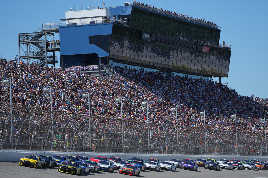 The field races during a NASCAR Cup Series auto race at Michigan International Speedway in Brooklyn, Mich., Sunday, June 7, 2026. (AP Photo/Paul Sancya)
