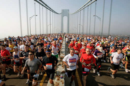 FILE - In is a Nov. 6, 2005, file photo, runners cross the upper level of the Verrazzano-Narrows Bridge from Staten Island to Brooklyn at the start of the New York City Marathon in New York. (AP Photo/Richard Drew, File) FILE - In is a Nov. 6, 2005, file photo, runners cross the upper level of the Verrazzano-Narrows Bridge from Staten Island to Brooklyn at the start of the New York City Marathon in New York. (AP Photo/Richard Drew, File)