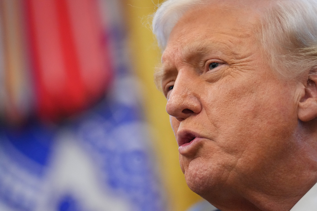 FILE - President Donald Trump speaks to reporters in the Oval Office of the White House, Monday, Nov. 10, 2025, in Washington. (AP Photo/Jacquelyn Martin, File)