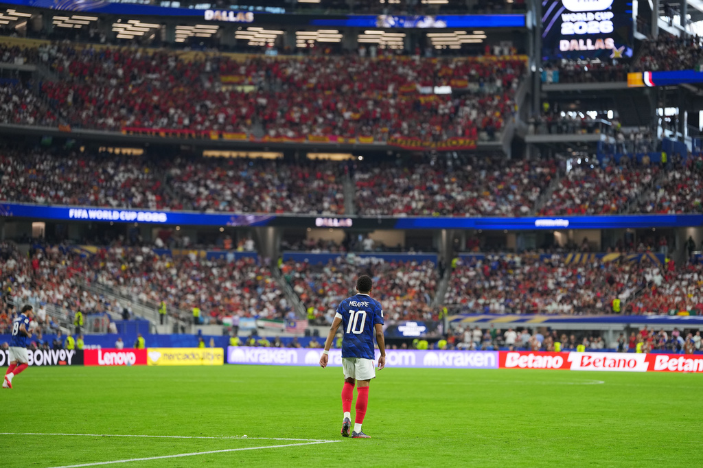 France's Kylian Mbappe walks the field during a World Cup semifinal soccer match against Spain in Arlington, Texas, near Dallas, Tuesday, July 14, 2026. (AP Photo/Julio Cortez)