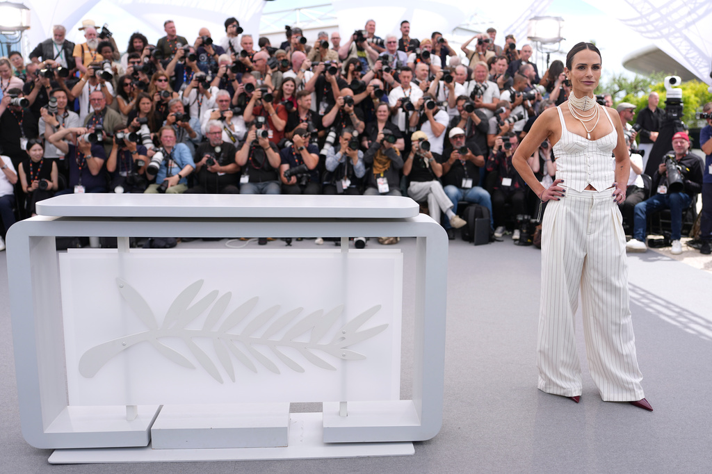 Jordana Brewster poses for photographers at the photo call for the 25th anniversary of the film 'The Fast and the Furious' during the 79th international film festival, Cannes, southern France, Wednesday, May 13, 2026. (AP Photo/Andreea Alexandru)