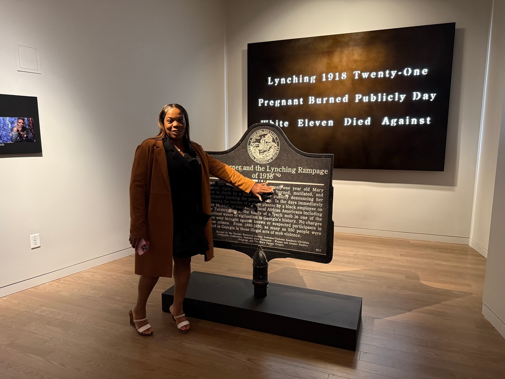 Katrina Thomas, a great-granddaughter of Mary Turner, who was lynched in 1918, poses with her historic marker at the National Center for Civil and Human Rights, on Dec. 6, 2025 in Atlanta. (AP Photo/Michael Warren)