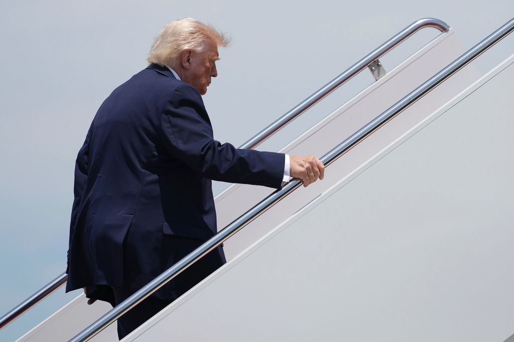 President Donald Trump boards Air Force One, Friday, June 5, 2026, at Joint Base Andrews, Md. (AP Photo/Mark Schiefelbein)