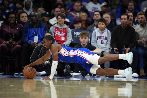 Philadelphia 76ers' Tyrese Maxey dives for a loose ball during the first half of an NBA basketball game against the Charlotte Hornets Saturday, Oct. 25, 2025, in Philadelphia. (AP Photo/Matt Slocum) Philadelphia 76ers' Tyrese Maxey dives for a loose ball during the first half of an NBA basketball game against the Charlotte Hornets Saturday, Oct. 25, 2025, in Philadelphia. (AP Photo/Matt Slocum)