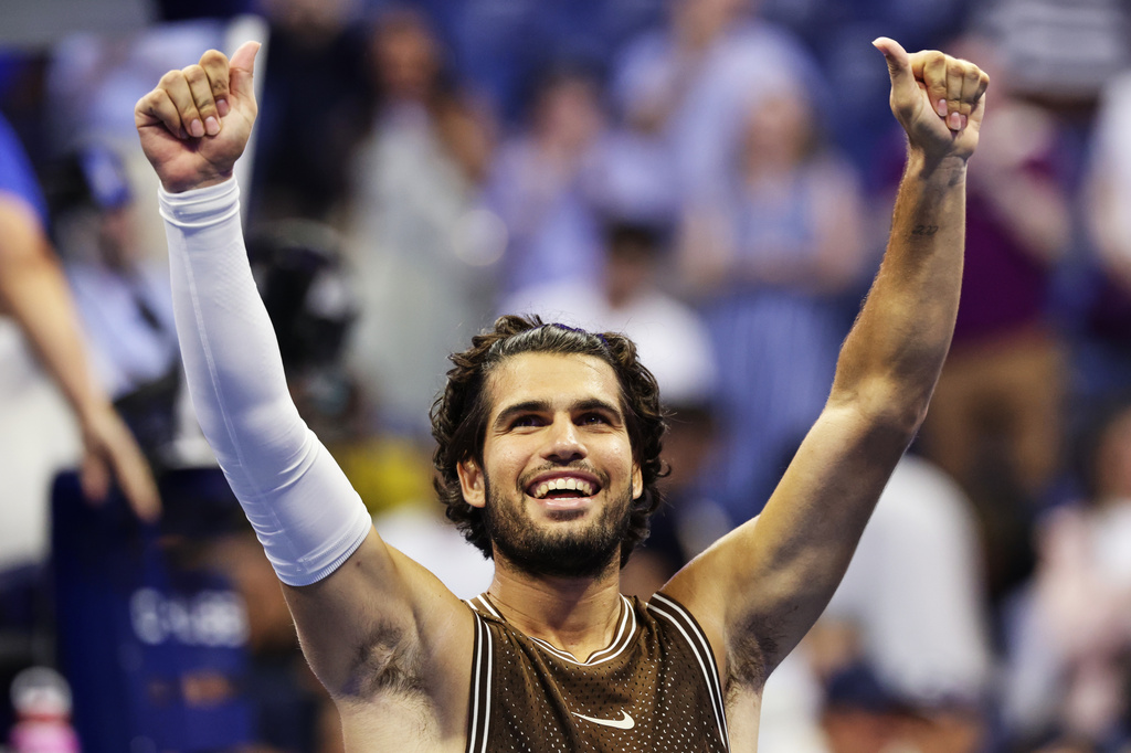 Carlos Alcaraz, of Spain, celebrates winning a match against Jaime Faria, of Portugal, during the second round of the U.S. Open tennis championships, Wednesday, Sept. 2, 2026, in New York. (AP Photo/Adam Hunger)