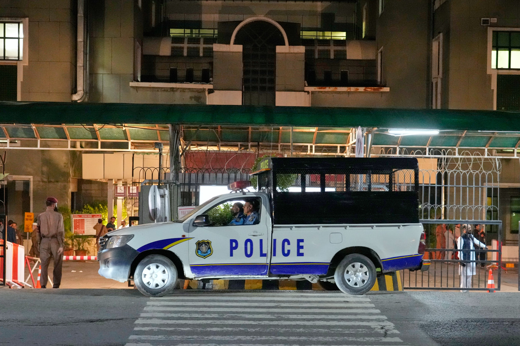 A police vehicle is parked outside the Shifa International Hospital, where imprisoned former Prime Minister Imran Khan will be transferred for a medical examination following Pakistan's Supreme Court order, in Islamabad, Pakistan, Thursday, Aug. 20, 2026. (AP Photo/Anjum Naveed)