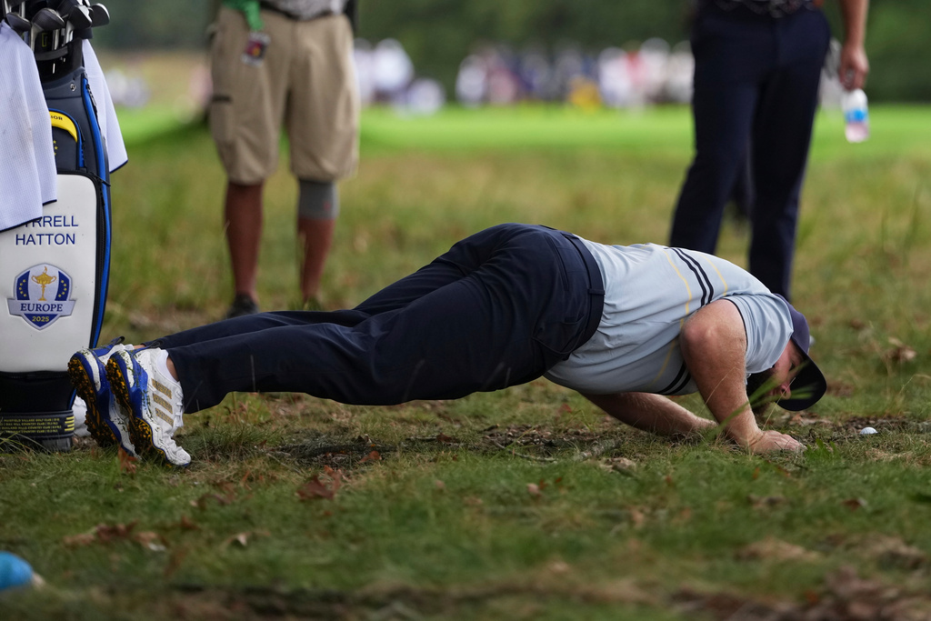 Europe's Tyrrell Hatton looks at the ball in the rough on the seventh hole at Bethpage Black golf course during the Ryder Cup golf tournament, Friday, Sept. 26, 2025, in Farmingdale, N.Y. (AP Photo/Matt Slocum)