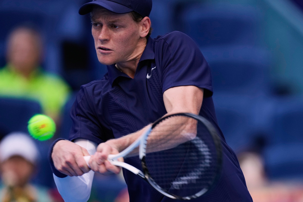 Jannik Sinner of Italy returns a backhand shot to Fabian Marozsan, of Hungary during a men's singles match of the China Open tennis tournament, at the National Tennis Center, in Beijing, China, Monday, Sept. 29, 2025. (AP Photo/Mahesh Kumar A.)