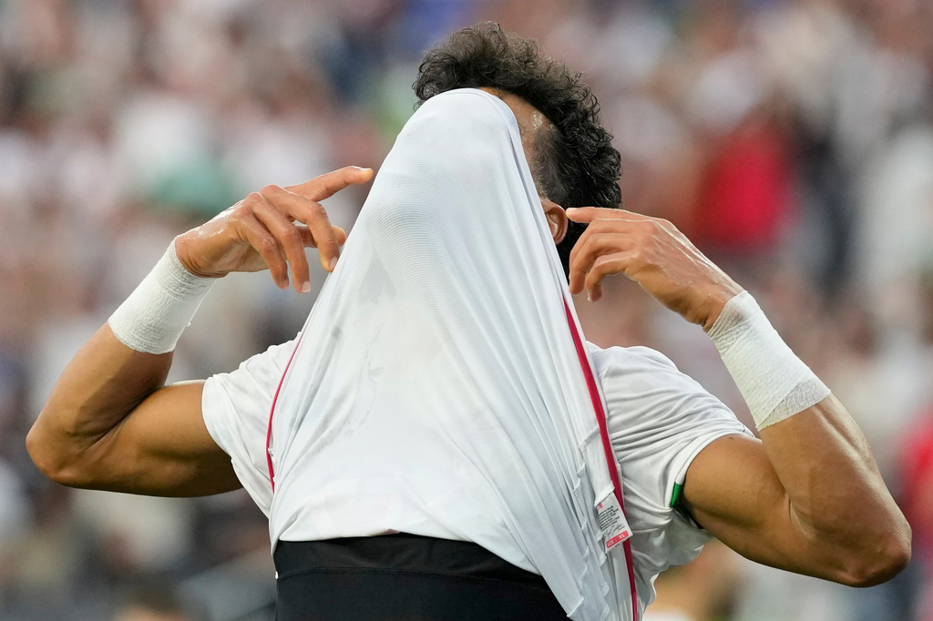 Iran's Ramin Rezaeian (23) celebrates after scoring a goal during the World Cup Group G soccer match between Iran and New Zealand in Inglewood, Calif., near Los Angeles, Monday, June 15, 2026. (AP Photo/Andre Penner)