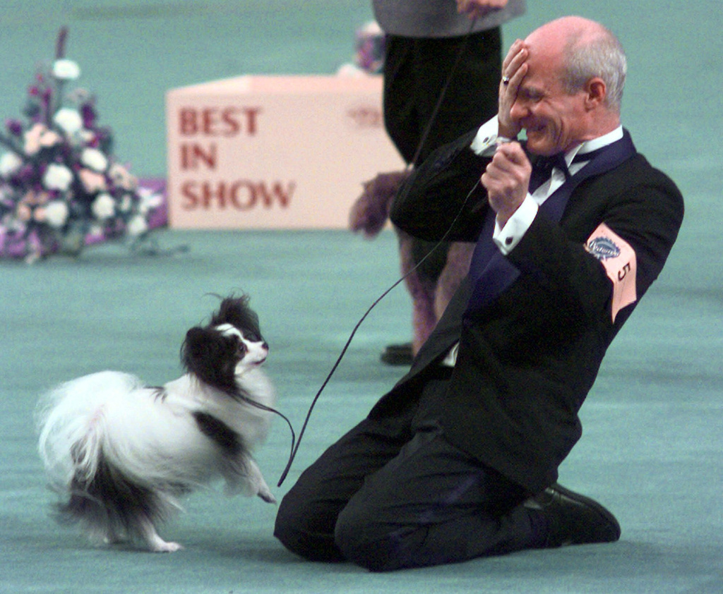 FILE - Kirby, a male Papillon, and his owner John Oulton react after winning best in show at the Westminster Kennel Club 1999 Dog Show at Madison Square Garden in New York Tuesday, Feb. 9, 1999. (AP Photo/Mark Lennihan, File)