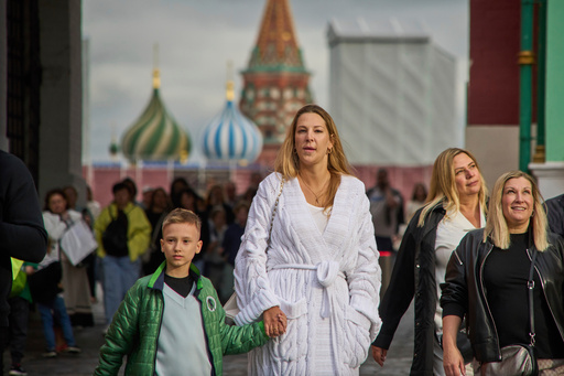 FILE - People walk from Red Square with St. Basil's Cathedral in the background in Moscow, Russia, Thursday, Aug. 14, 2025. (AP Photo/Alexander Zemlianichenko, File) FILE - People walk from Red Square with St. Basil's Cathedral in the background in Moscow, Russia, Thursday, Aug. 14, 2025. (AP Photo/Alexander Zemlianichenko, File)