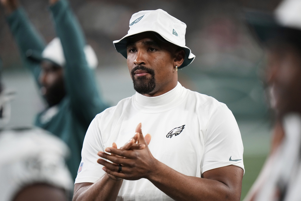 Philadelphia Eagles quarterback Jalen Hurts watches from the sideline in the second half of a preseason NFL football game against the New York Jets in East Rutherford, N.J., Friday, Aug. 22, 2025. (AP Photo/Frank Franklin)
