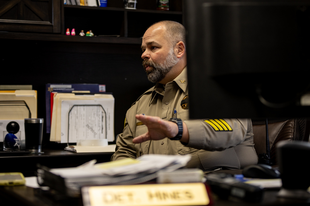 Detective Scott Hines responds to questions regarding the Calo Programs Residential Treatment Center on Feb. 24, 2026, in his office at the Camden County Sheriffs Department in Camdenton, Mo. (AP Photo/Austin Johnson)