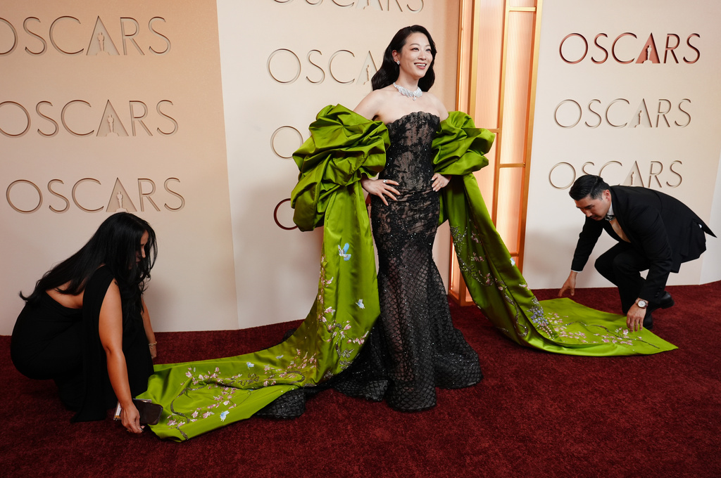 Arden Cho arrives at the Oscars on Sunday, March 15, 2026, at the Dolby Theatre in Los Angeles. (Photo by Richard Shotwell/Invision/AP)