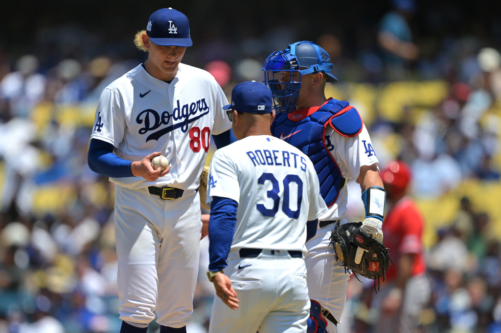 Los Angeles Dodgers starting pitcher Emmet Sheehan (80) is pulled from the game by Dodgers' manager Dave Roberts (30) during the second inning of a baseball game against the Los Angeles Angels, Sunday, June 7, 2026, in Los Angeles. (AP Photo/Jayne Kamin-Oncea)