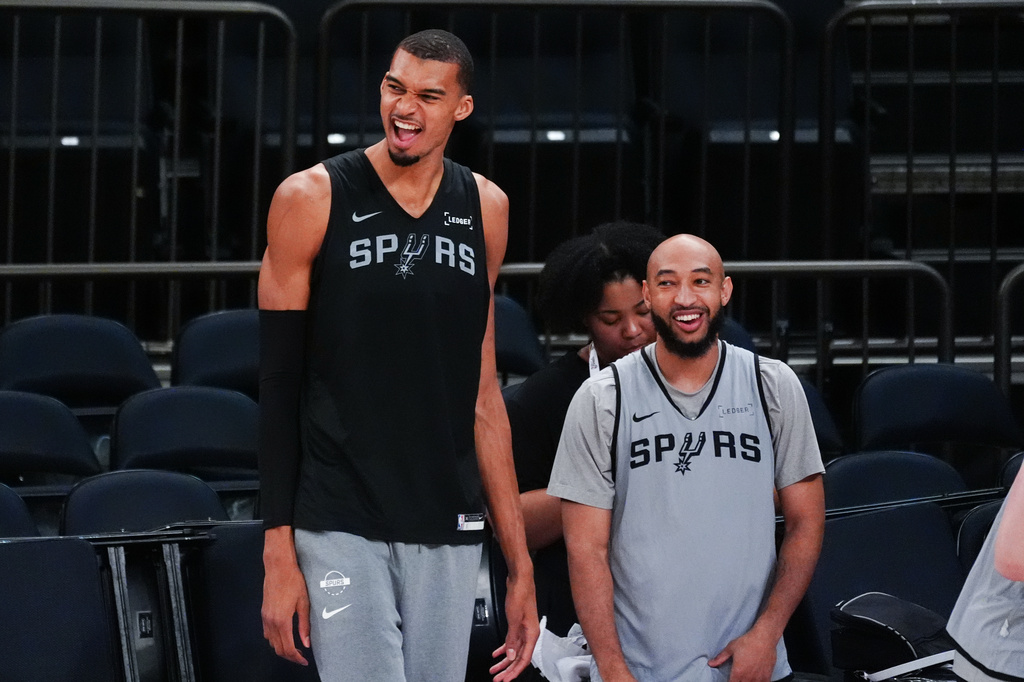 San Antonio Spurs forward Victor Wembanyama laughs during practice prior to Game 3 of the NBA Finals basketball series against the New York Knicks, Sunday, June 7, 2026, in New York. (AP Photo/Ross D. Franklin)