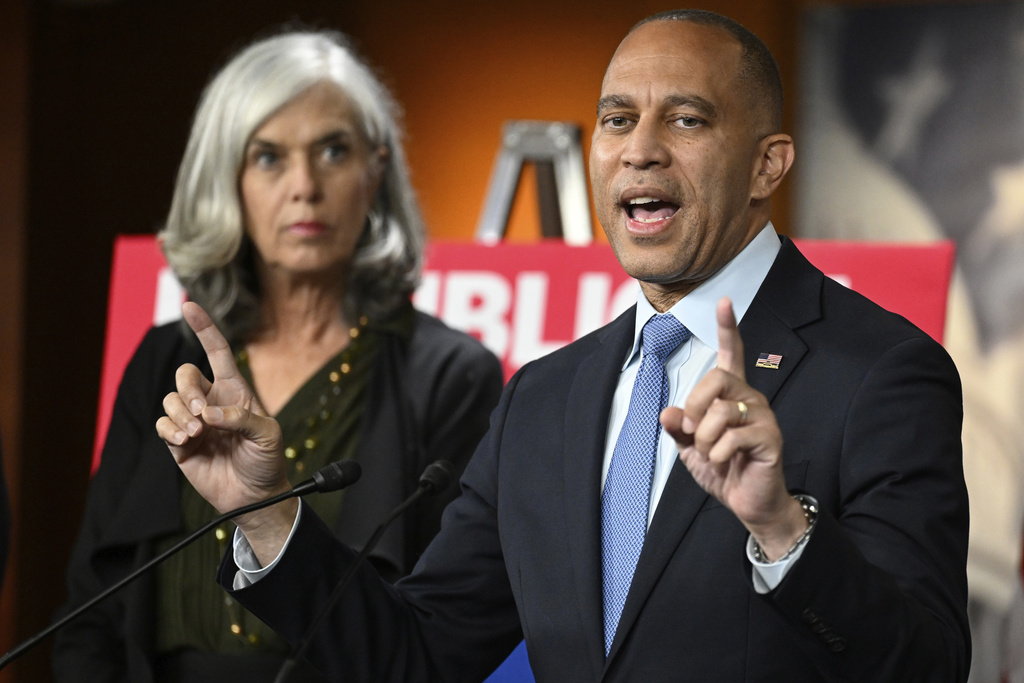House Minority Leader Hakeem Jeffries, D-N.Y.,, right, and Minority Whip Katherine Clark, D-Mass., participate in a news conference on the 8th day of government shutdown at the U.S. Capitol on Wednesday, Oct. 8, 2025, in Washington. (AP Photo/John McDonnell)