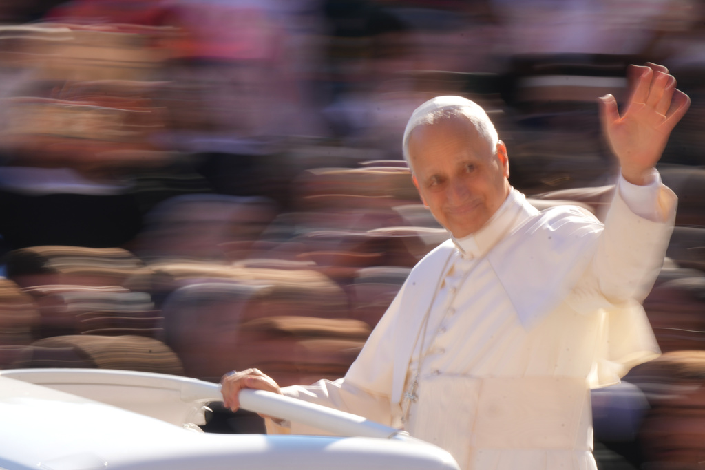 Pope Leo XIV arrives in St. Peter's Square for his weekly general audience, at the Vatican, Wednesday, Oct. 8, 2025. (AP Photo/Andrew Medichini)