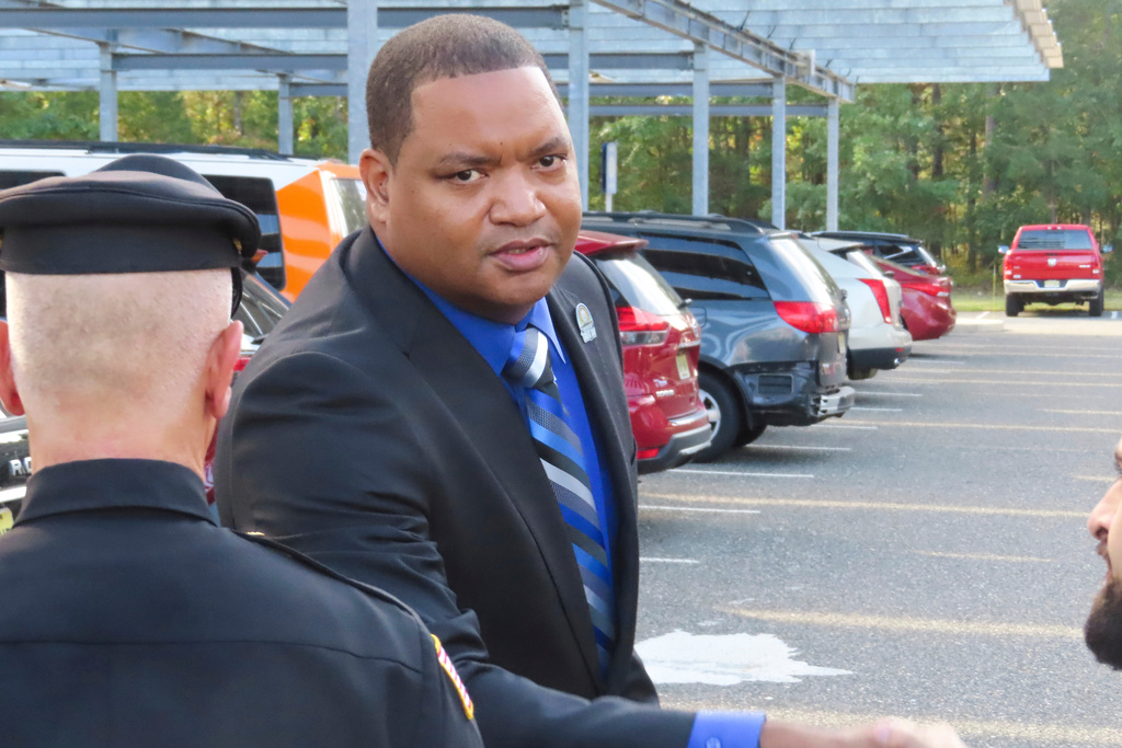 FILE - Atlantic City Mayor Marty Small Sr. shakes the hand of one of his lawyers after a court appearance in Mays Landing, N.J., Thursday, Oct. 10, 2024. (AP Photo/Wayne Parry, File)