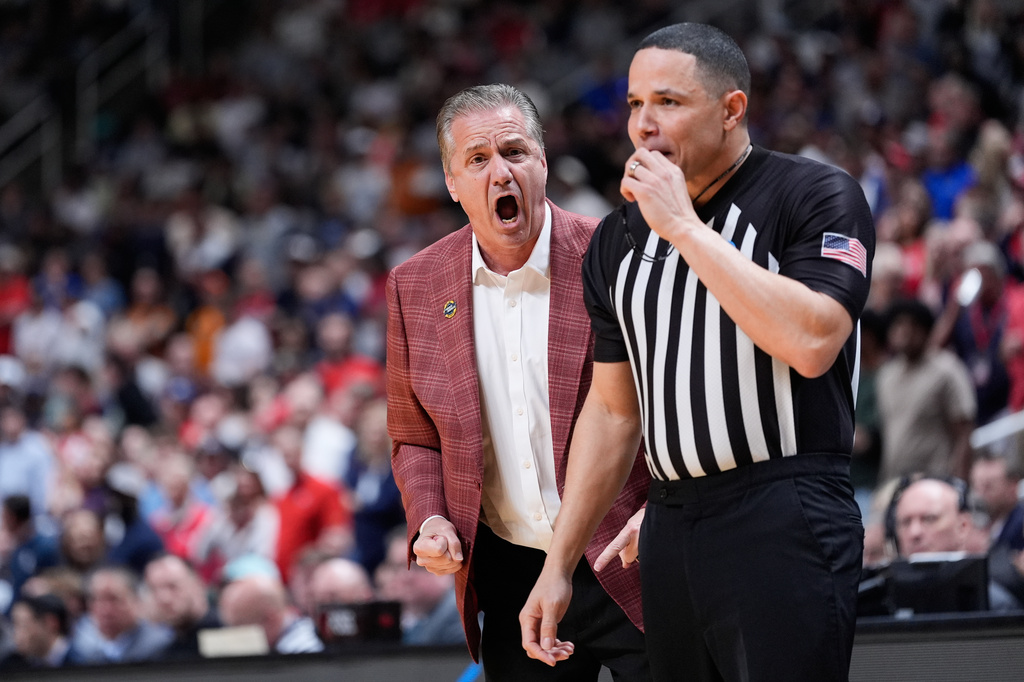 Arkansas head coach John Calipari argues a call during the first half in the Sweet 16 of the NCAA college basketball tournament against Arizona, Thursday, March 26, 2026, in San Jose, Calif. (AP Photo/Godofredo A. Vásquez)
