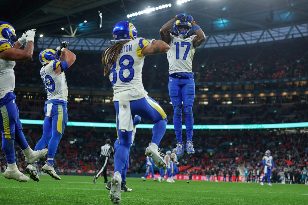 Los Angeles Rams wide receiver Davante Adams (17) celebrates after scoring a touchdown during the second half of an NFL football game between the Los Angeles Rams and the Jacksonville Jaguars in London, Sunday, Oct. 19, 2025. (AP Photo/Ian Walton)