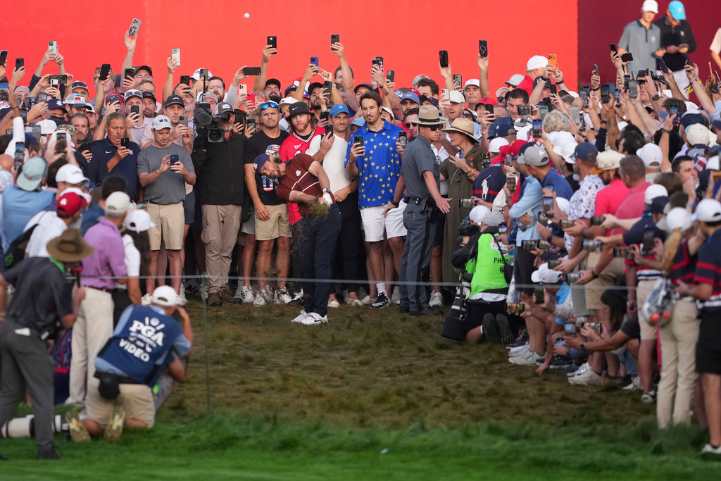 Europe's Tommy Fleetwood hits from the rough on the first hole at Bethpage Black golf course during the Ryder Cup golf tournament, Saturday, Sept. 27, 2025, in Farmingdale, N.Y. (AP Photo/Lindsey Wasson)